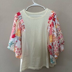A Classy Chic Boutique Cream Top with Floral Puff Sleeves